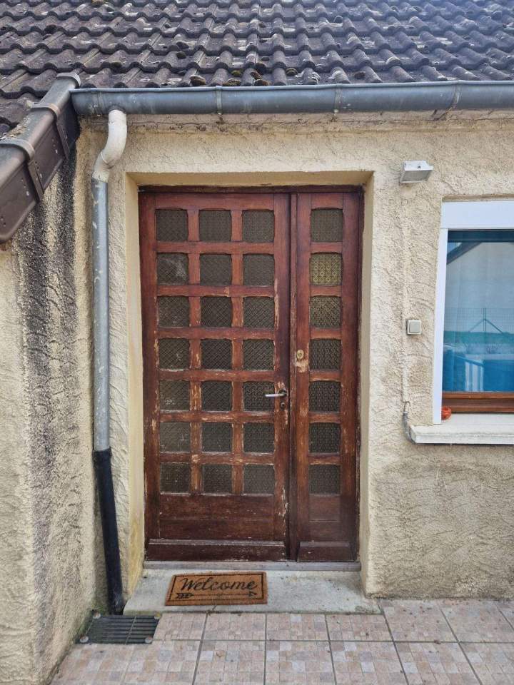 Pose de porte bois Moulins